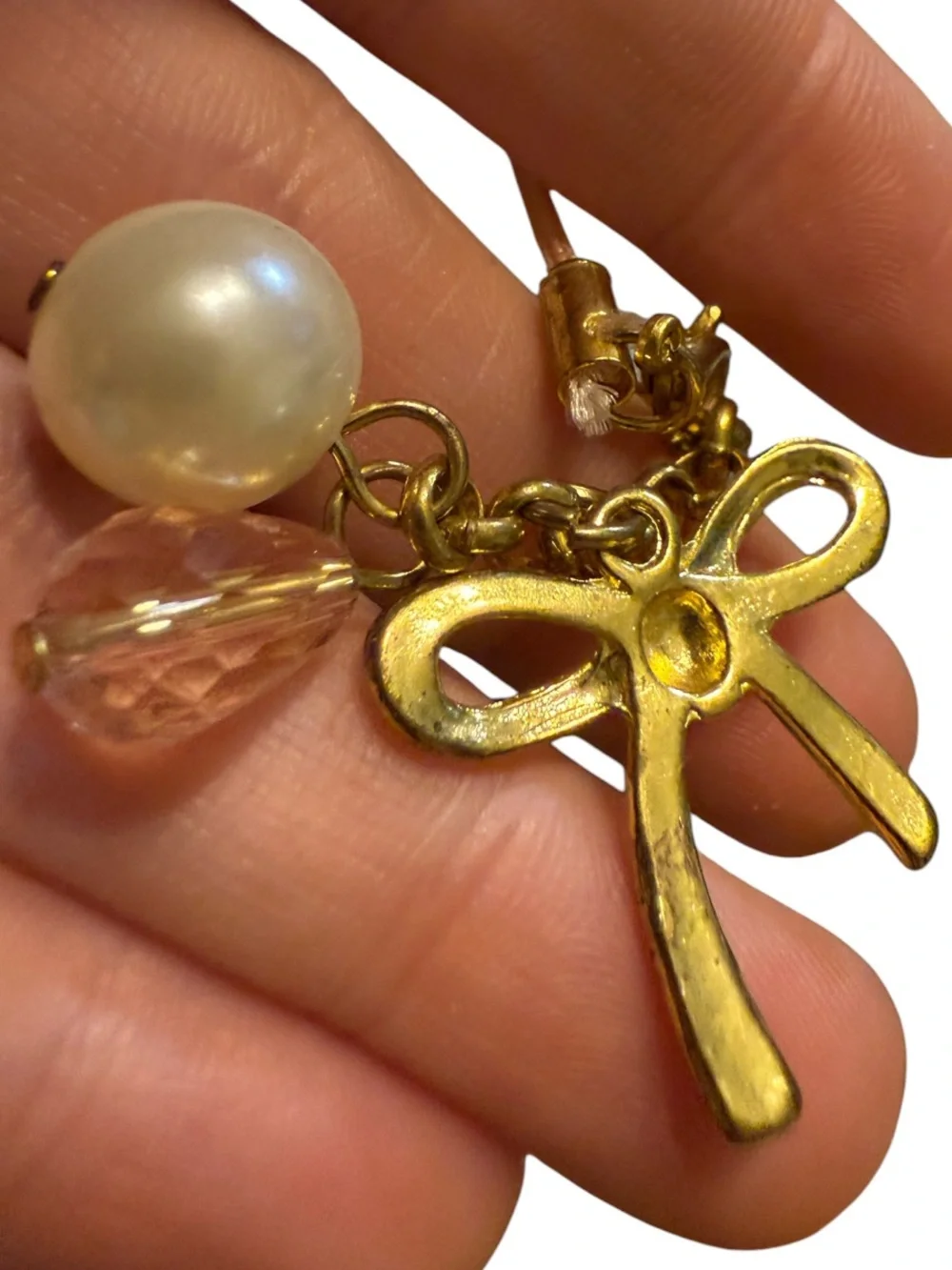 BENEIGE handmade bow and pearl bag charm featuring a gold-toned bow accent